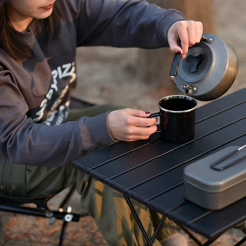 Table pliante compacte légère d'extérieur